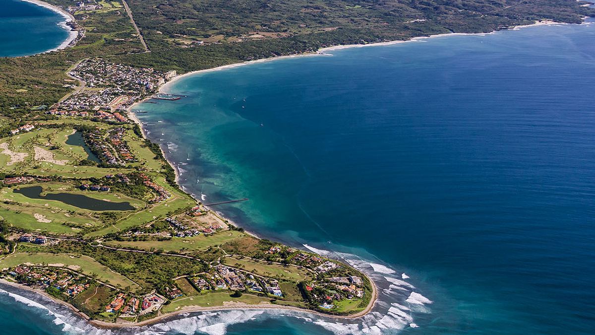 Turquoise water and the golf peninsula seen from the air, Punta Mita